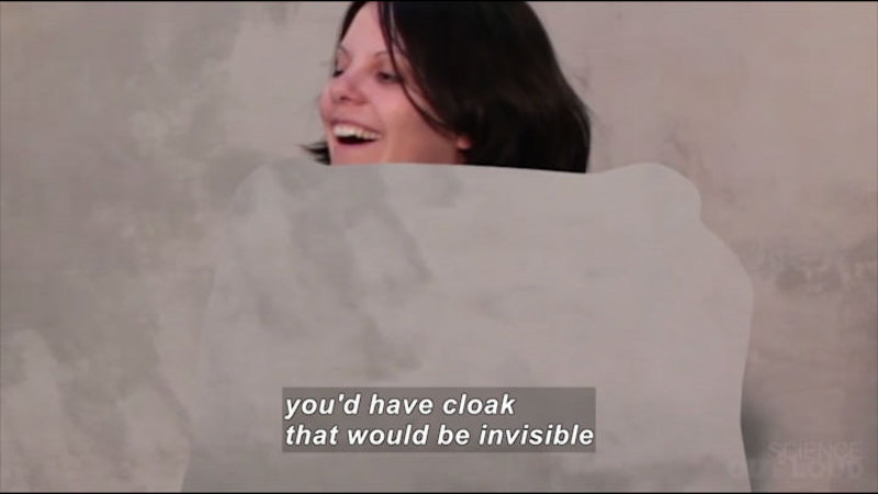 Woman wrapped in a blanket. Caption: you'd have cloak that would be invisible. 