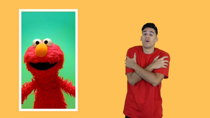 Still image from: Plaza Sésamo in ASL: Elmo y la magia de los abrazos (Spanish)