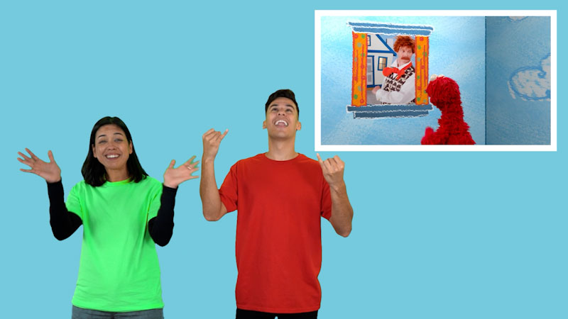 Still image from: Plaza Sésamo in ASL: El mundo de Elmo - Bailes (Spanish)